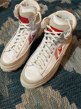 White High-Top Converse Sneakers with Red Star Accent